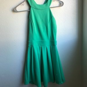 TURQUOISE DRESS WITH BOW IN BACK